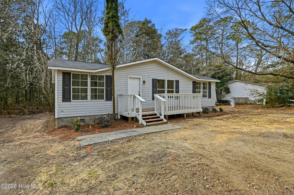 Photo of 808 Wildwood Circle, Hampstead, NC 28443 (MLS # 100552773)