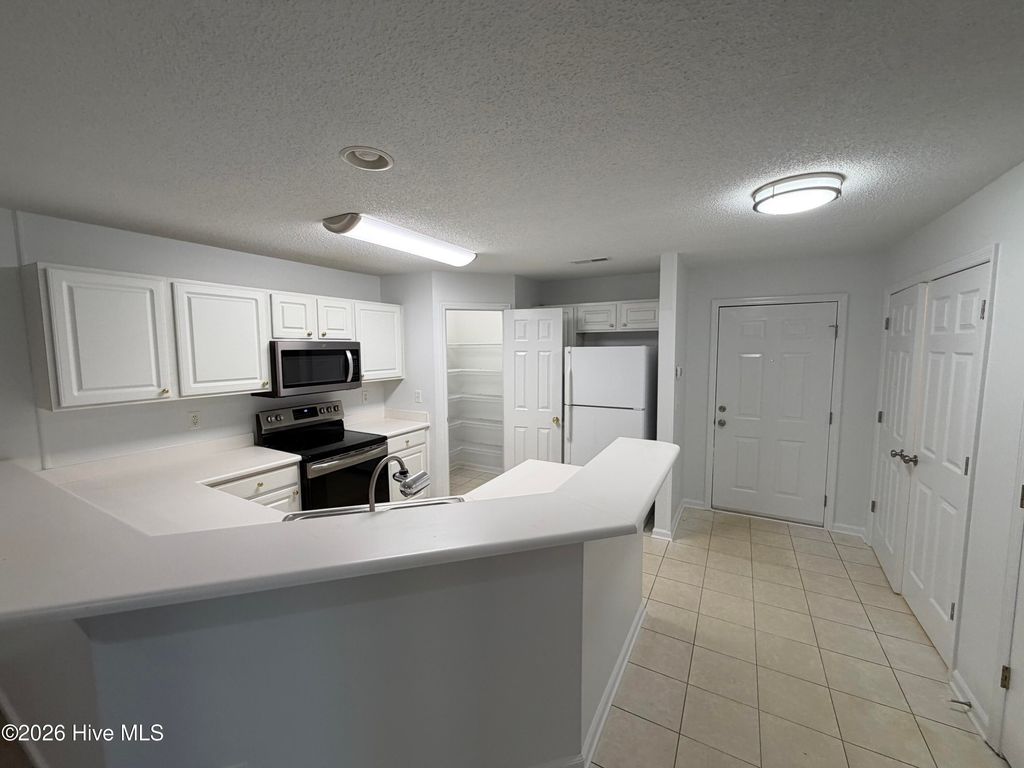 Photo of 5010 Hunters Trail #Unit 13, Wilmington, NC 28405 (MLS # 100562218)