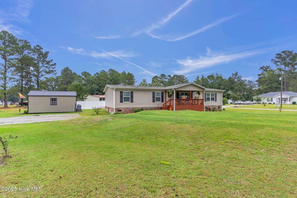 Photo of 414 Sherrow River Drive SW, Shallotte, NC 28470 (MLS # 100533753)