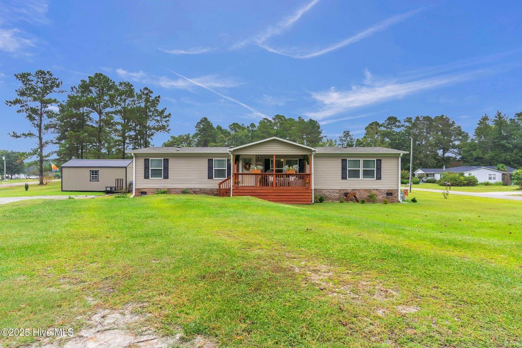 Photo of 414 Sherrow River Drive SW, Shallotte, NC 28470 (MLS # 100533753)