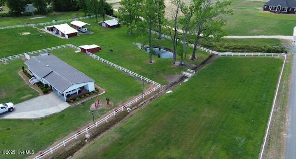 Photo of 4998 Peacock Road, Whiteville, NC 28472 (MLS # 100554772)