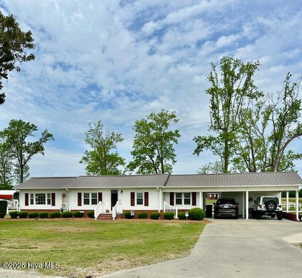 Photo of 4998 Peacock Road, Whiteville, NC 28472 (MLS # 100554772)