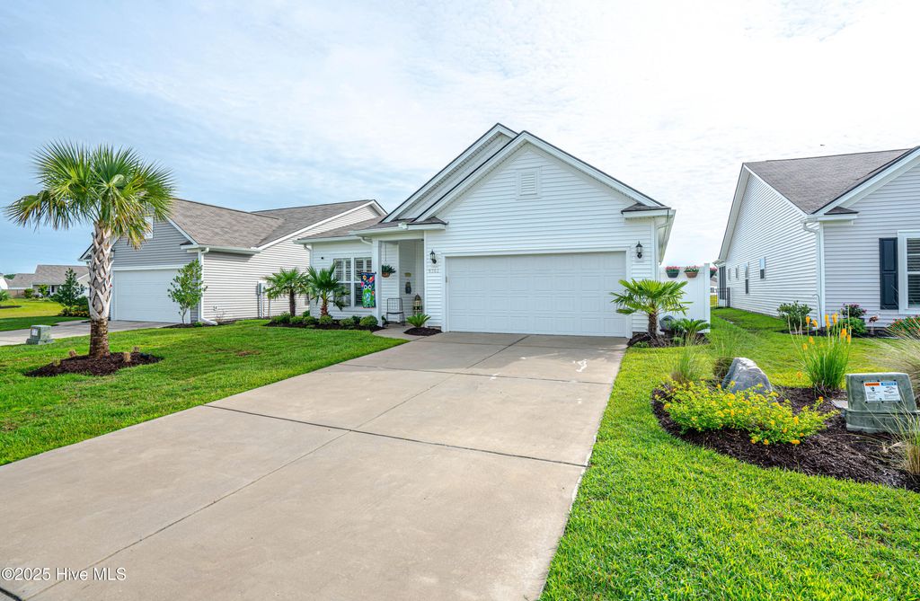 Photo of 9363 Eagle Ridge Drive, Carolina Shores, NC 28467 (MLS # 100575537)