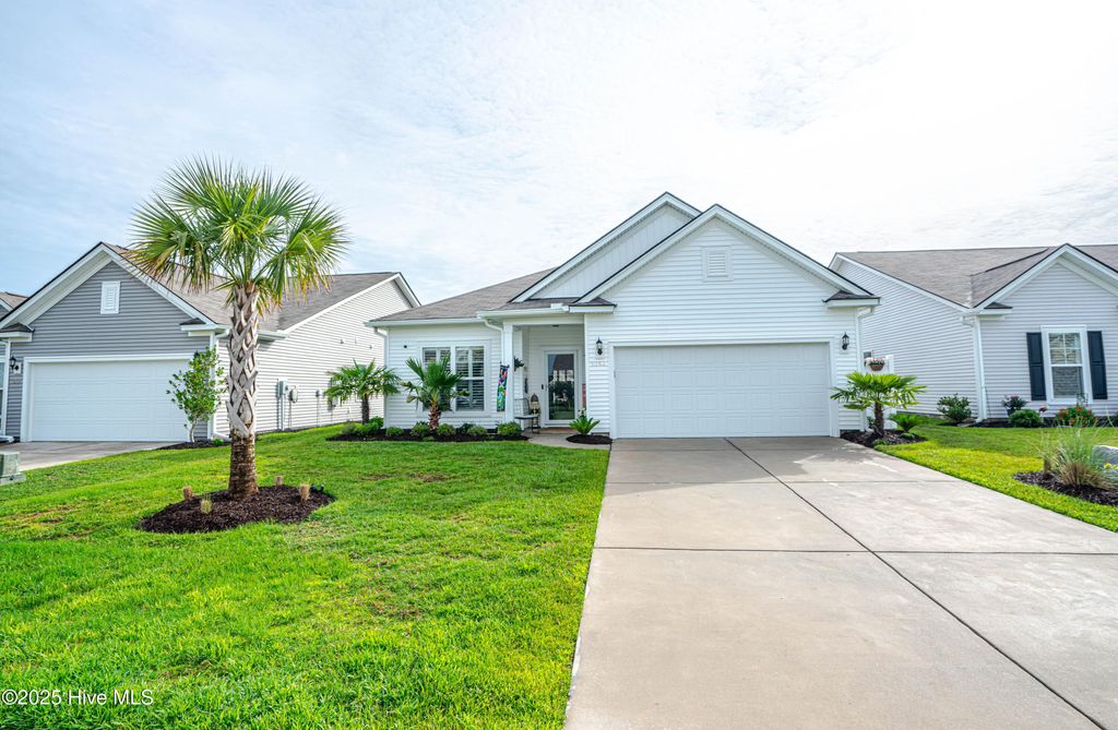 Photo of 9363 Eagle Ridge Drive, Carolina Shores, NC 28467 (MLS # 100575537)