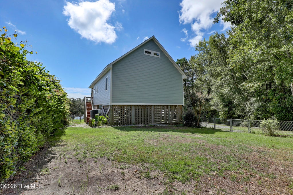Photo of 716 Bay Harbor Drive, Hampstead, NC 28443 (MLS # 100600678)