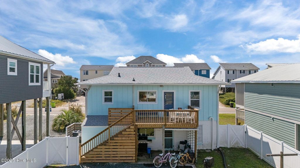 Photo of 1918 E Beach Drive, Oak Island, NC 28465 (MLS # 100536358)
