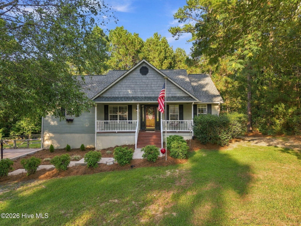 Photo of 135 Pinesage Drive, West End, NC 27376 (MLS # 100603580)