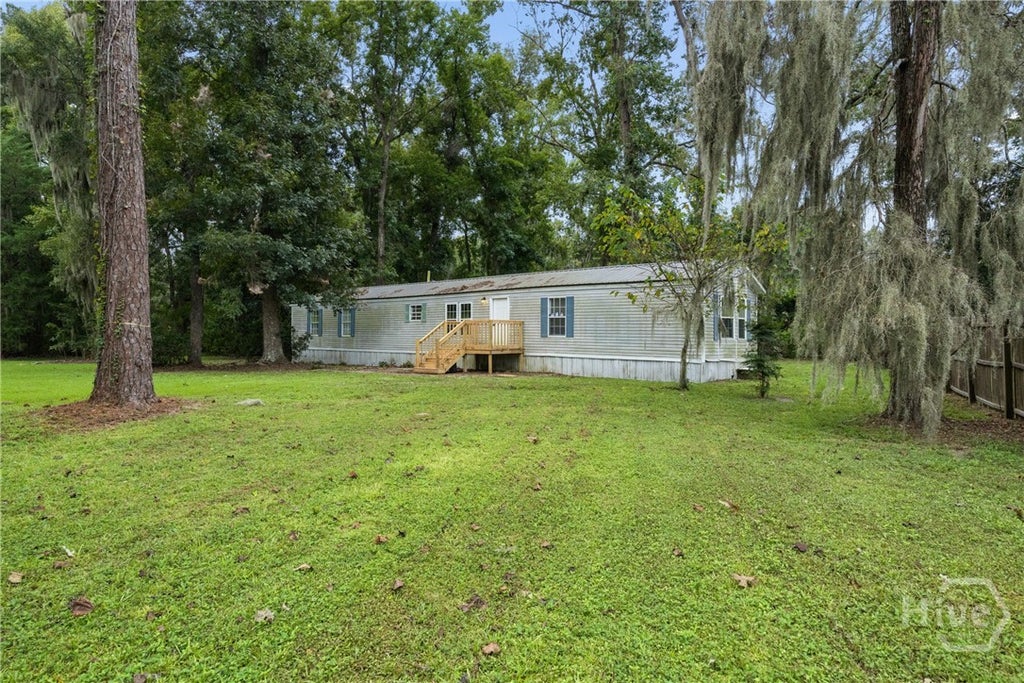 Photo of 253 Cornfield Avenue, Midway, GA 31320 (MLS # SA365342)