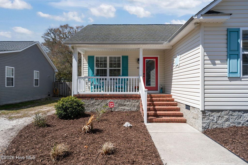 Photo of 137 NE 4th Street, Oak Island, NC 28465 (MLS # 100564020)
