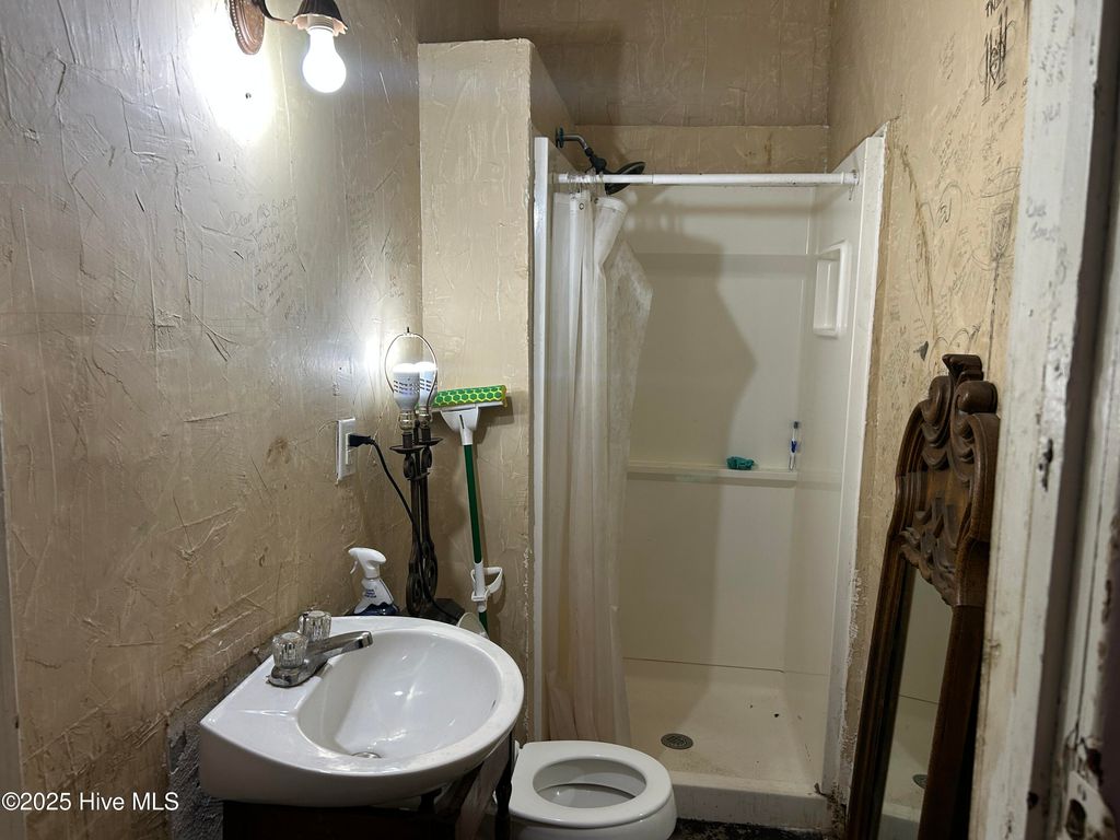 Photo of 211 E Elm Street, Goldsboro, NC 27530 (MLS # 100558400)