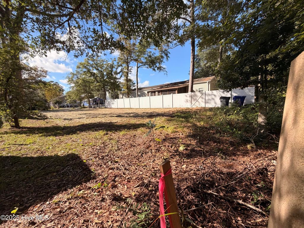 Photo of 310 NE 75th Street, Oak Island, NC 28465 (MLS # 100519753)