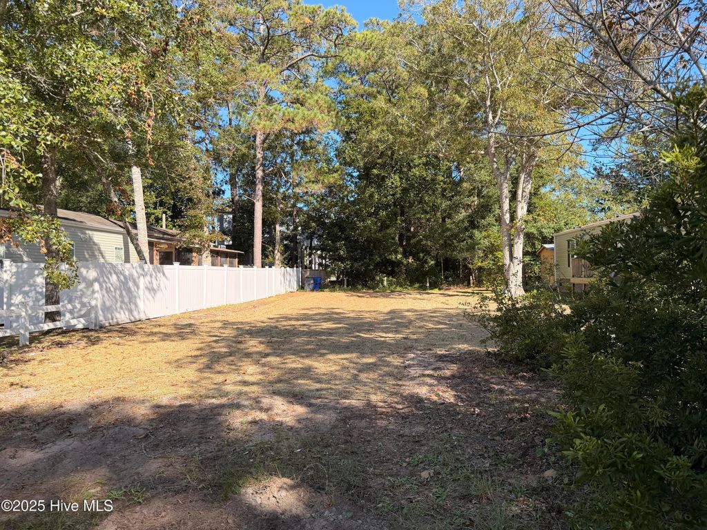 Photo of 310 NE 75th Street, Oak Island, NC 28465 (MLS # 100519753)