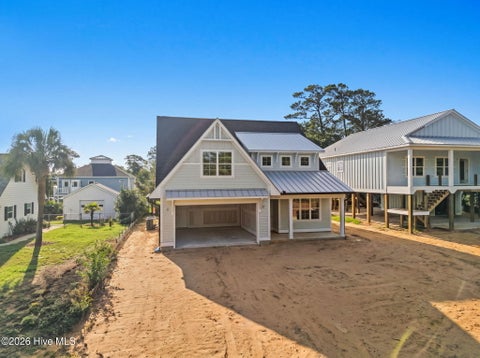 Photo of 312 NE 58th Street, Oak Island, NC 28465 (MLS # 100594847)