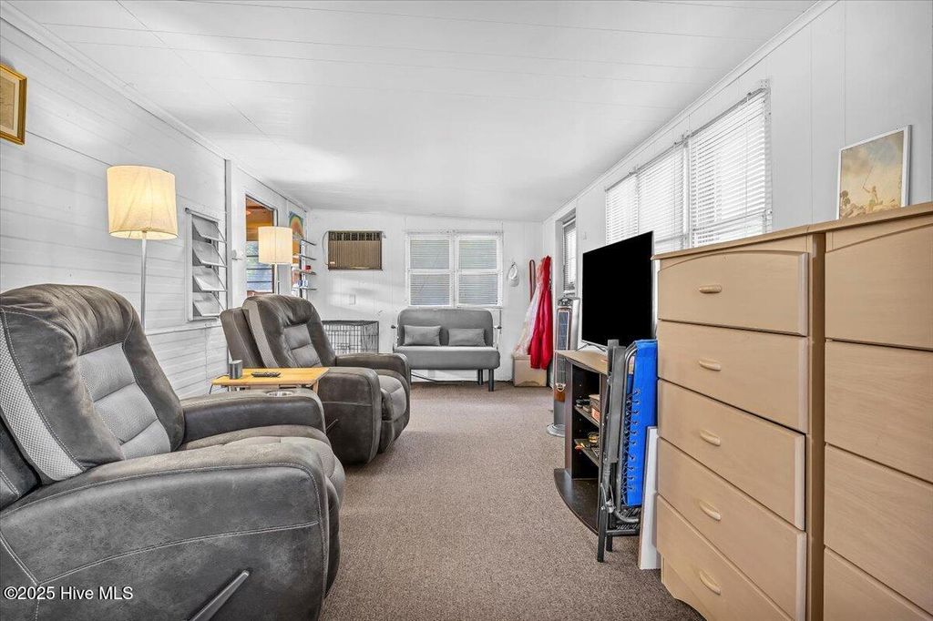 Photo of 230 NE 66th Street, Oak Island, NC 28465 (MLS # 100525763)