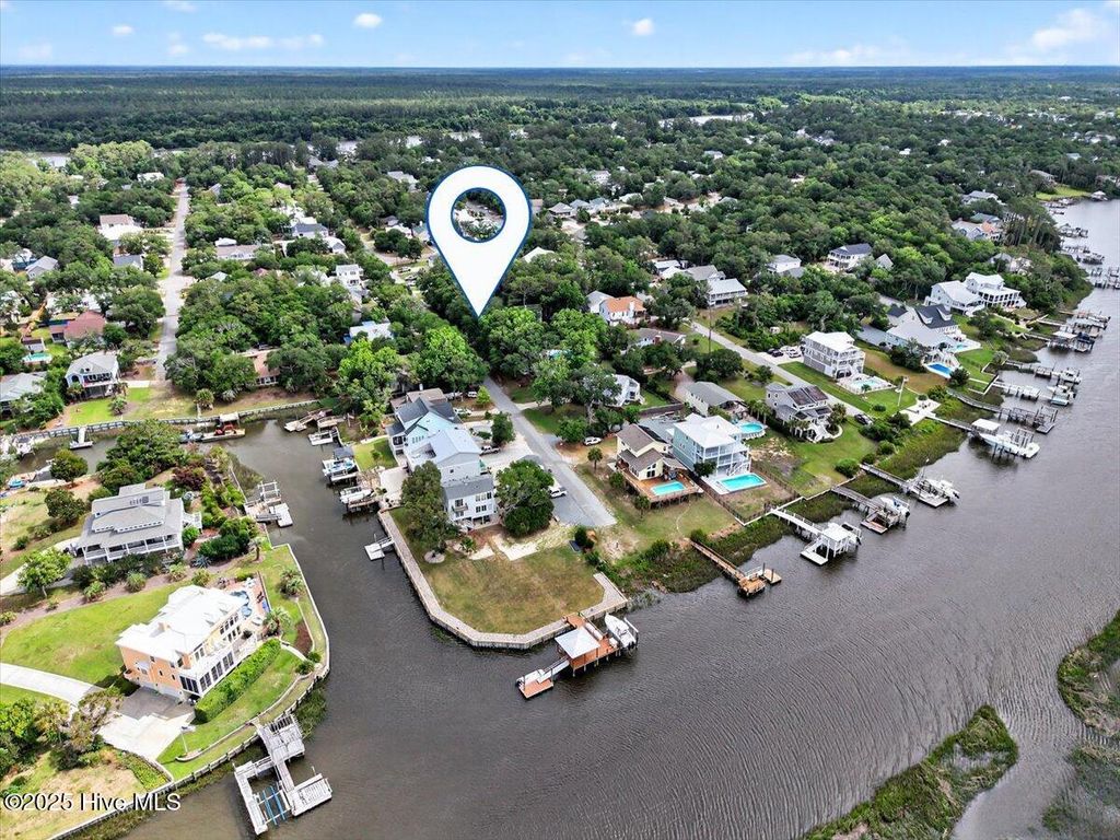 Photo of 104 SW 24th Street, Oak Island, NC 28465 (MLS # 100510821)