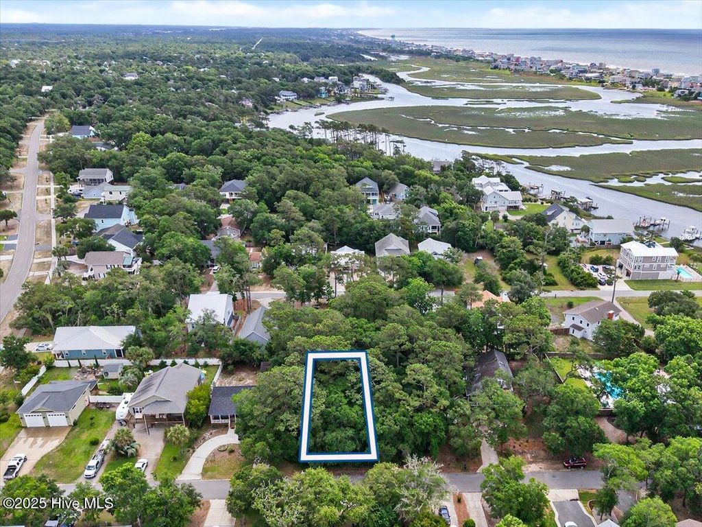 Photo of 104 SW 24th Street, Oak Island, NC 28465 (MLS # 100510821)