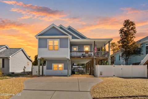 Photo of 128 NE 8th Street, Oak Island, NC 28465 (MLS # 100610459)