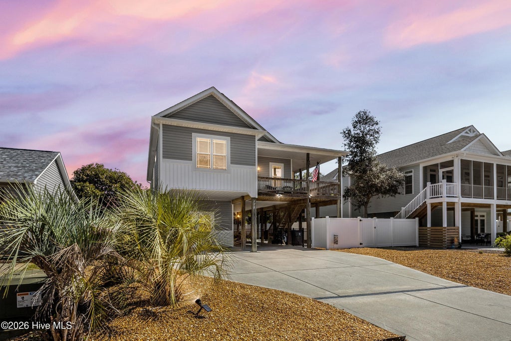 Photo of 128 NE 8th Street, Oak Island, NC 28465 (MLS # 100610459)
