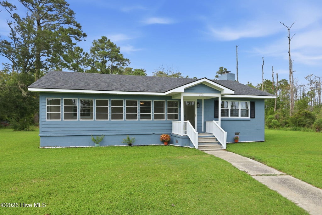 Photo of 395 Nelson Neck Road, Sea Level, NC 28577 (MLS # 100599943)