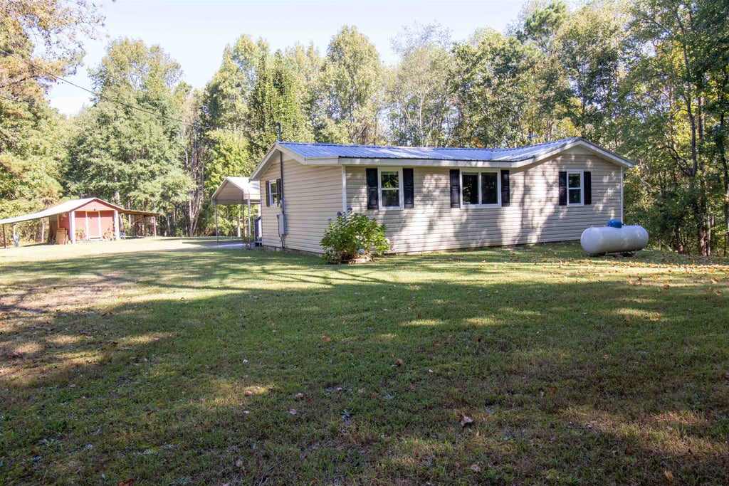 Photo of 106 Hand Rd, Falkville, AL 35622 (MLS # 531707)