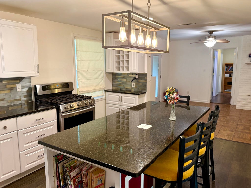 Photo of 209 Flurnoy Ave, Florence, AL 35633 (MLS # 531661)