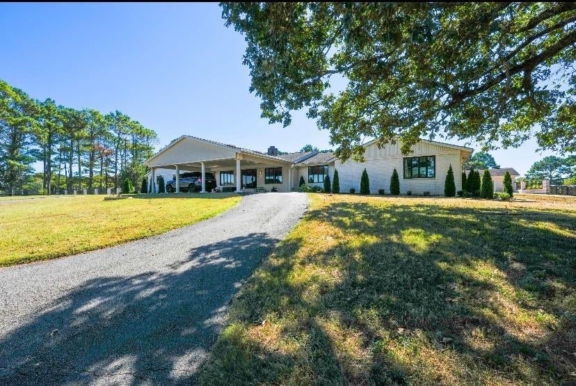 Photo of 4916 River Rd, Muscle Shoals, AL 35661 (MLS # 531668)