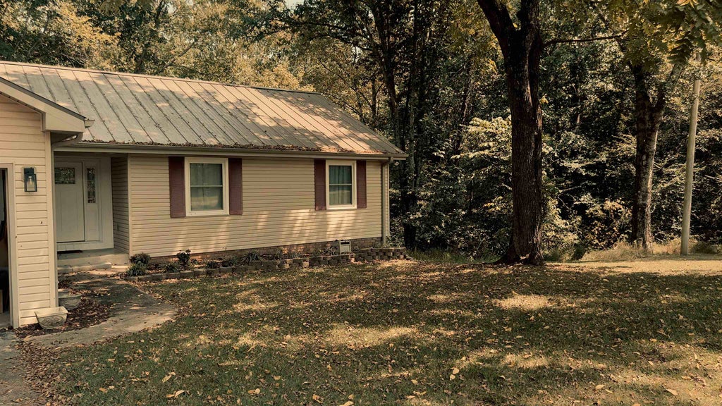 Photo of 314 Whitten Rd, Russellville, AL 35653 (MLS # 531073)