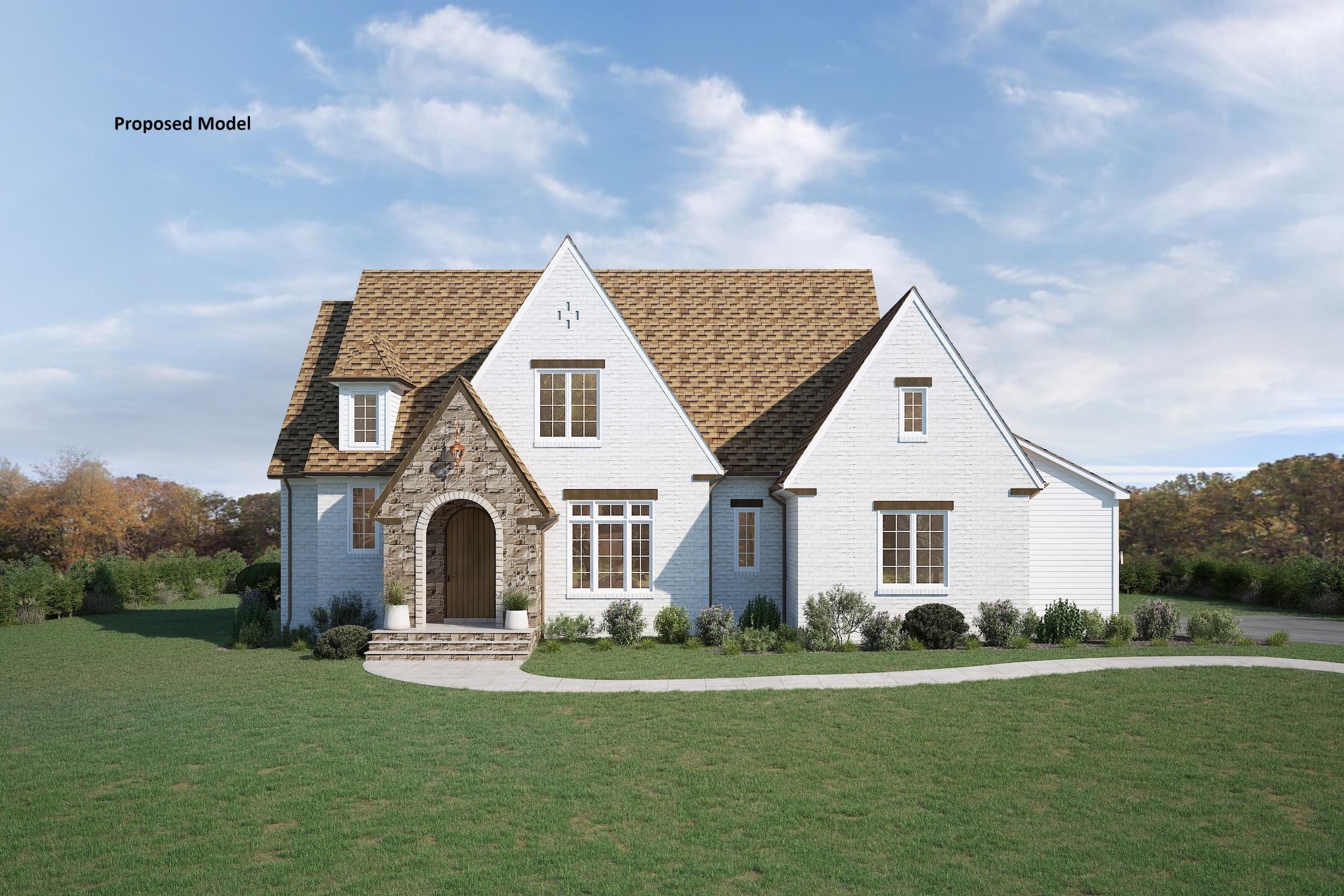 Proposed model of a white-brick house with a stone arched entry and multiple steep gables.