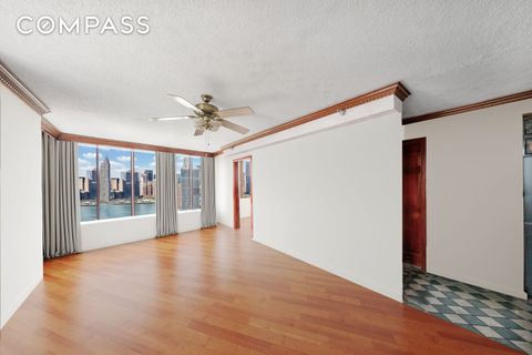 Photo of 4-74 48th Avenue #27A, Queens, NY 11109 (MLS # RLS20039349)