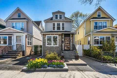 Photo of 68-42 Loubet Street, Queens, NY 11375 (MLS # RLS20085235)