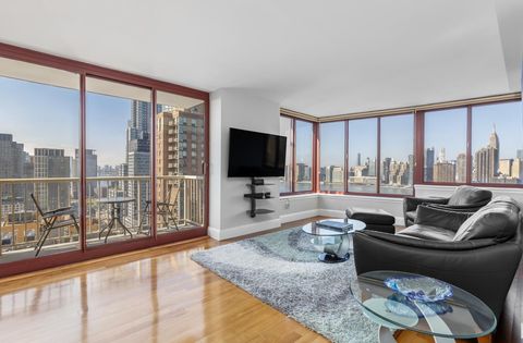 Photo of 4-74 48th Avenue #25-A, Queens, NY 11109 (MLS # RLS20049043)
