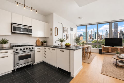 Photo of 46-30 CENTER Boulevard #404, Queens, NY 11109 (MLS # RLS20113539)