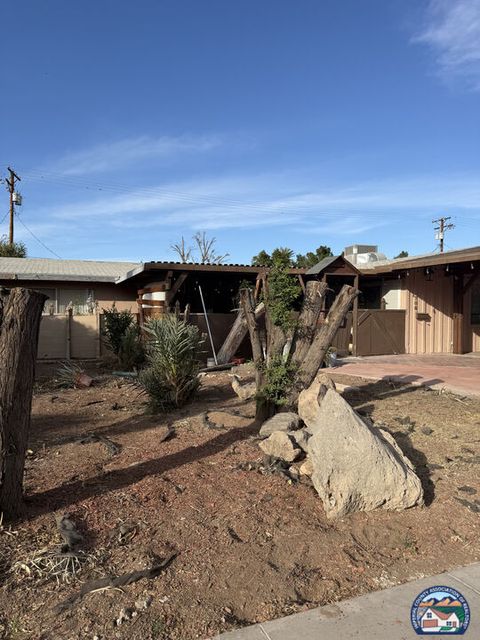 Photo of 706 Yucca Dr, El Centro, CA 92243 (MLS # 26656331IC)