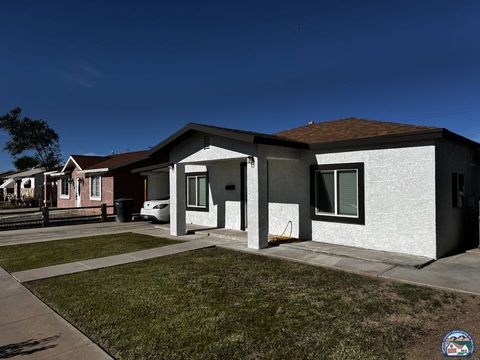Photo of 108 W Holt Ave, El Centro, CA 92243 (MLS # 25620479IC)