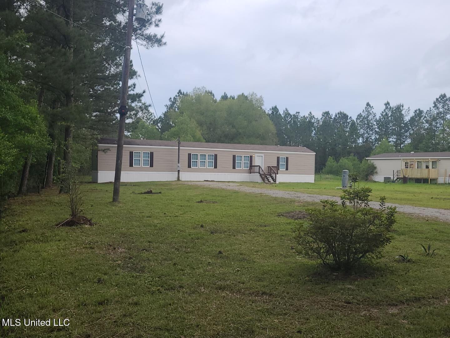 23428 E Dubuisson Road, Pass Christian, Mississippi image 1
