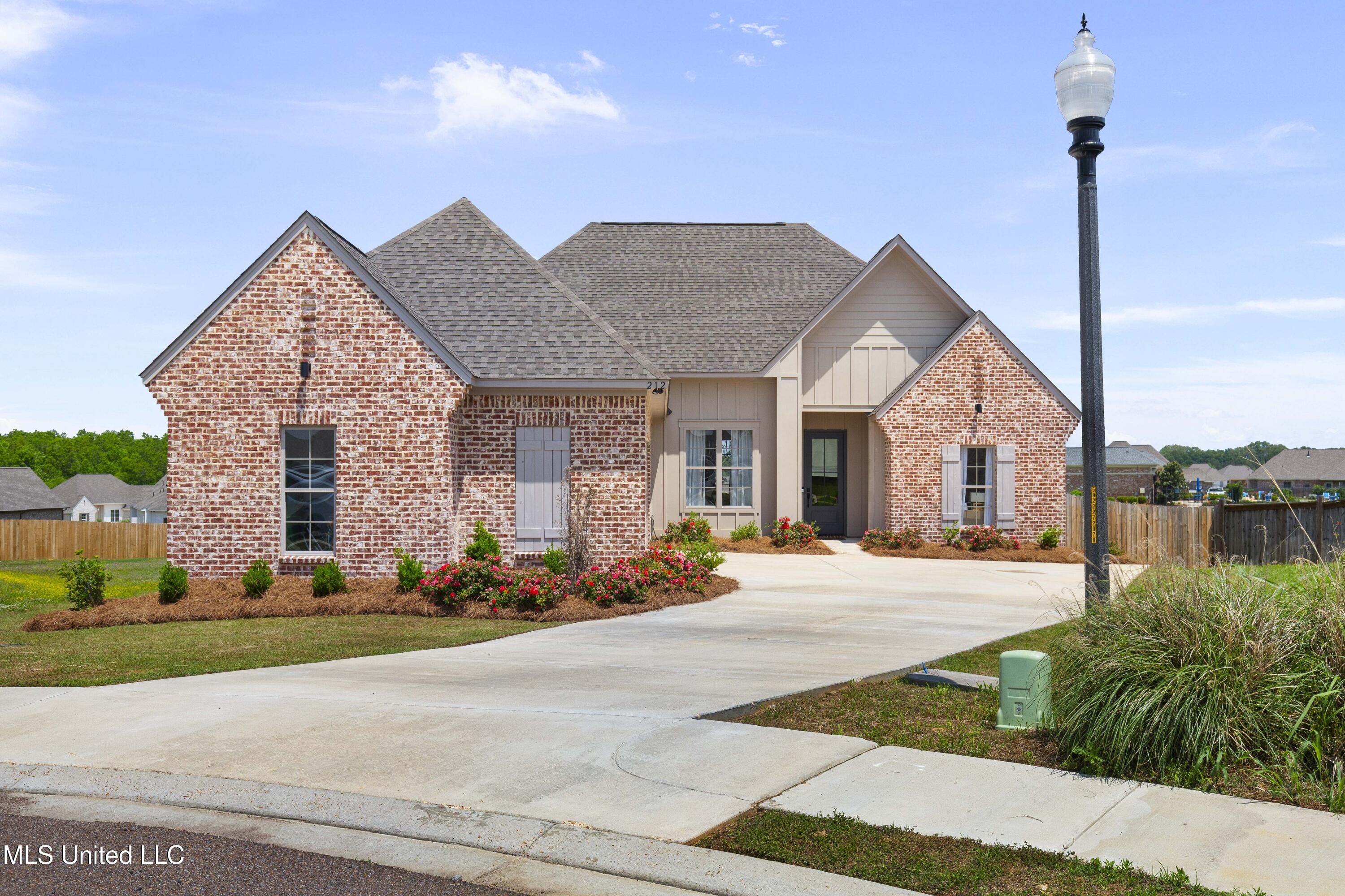 212 Ashbury Cove, Canton, Mississippi image 1