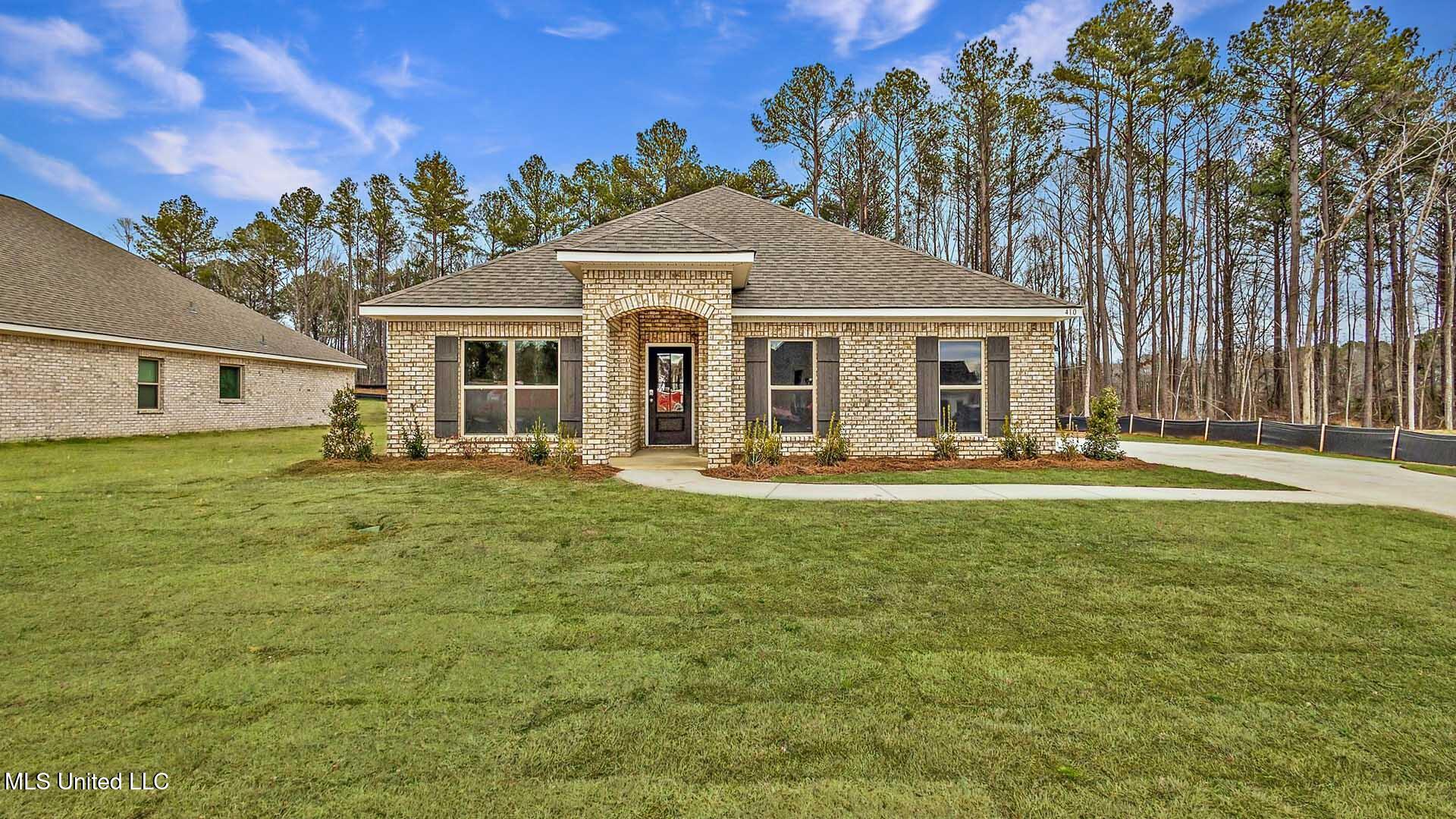 710 Honeysuckle Loop, Canton, Mississippi image 1