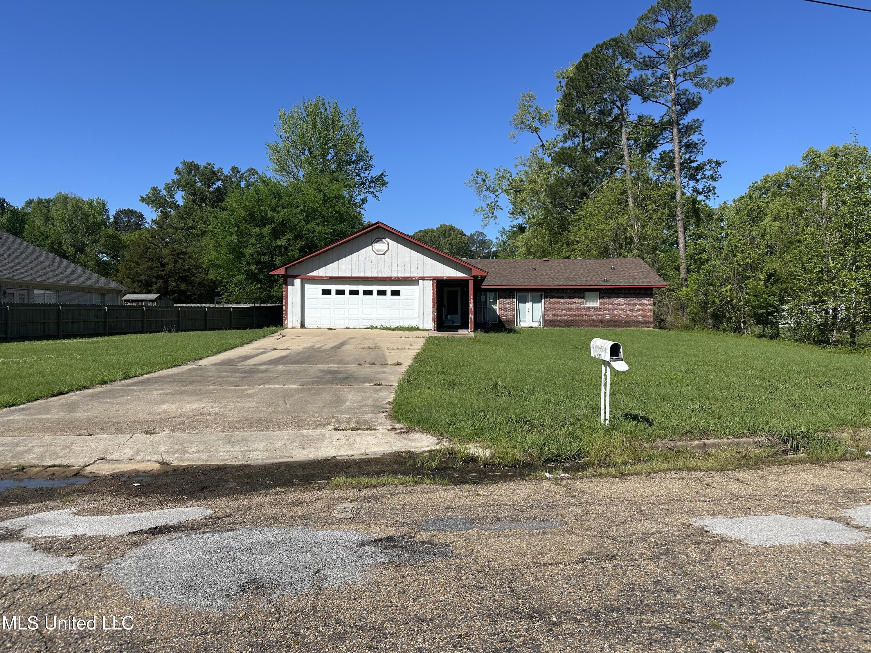 6037 Floral Drive, Jackson, Mississippi image 1