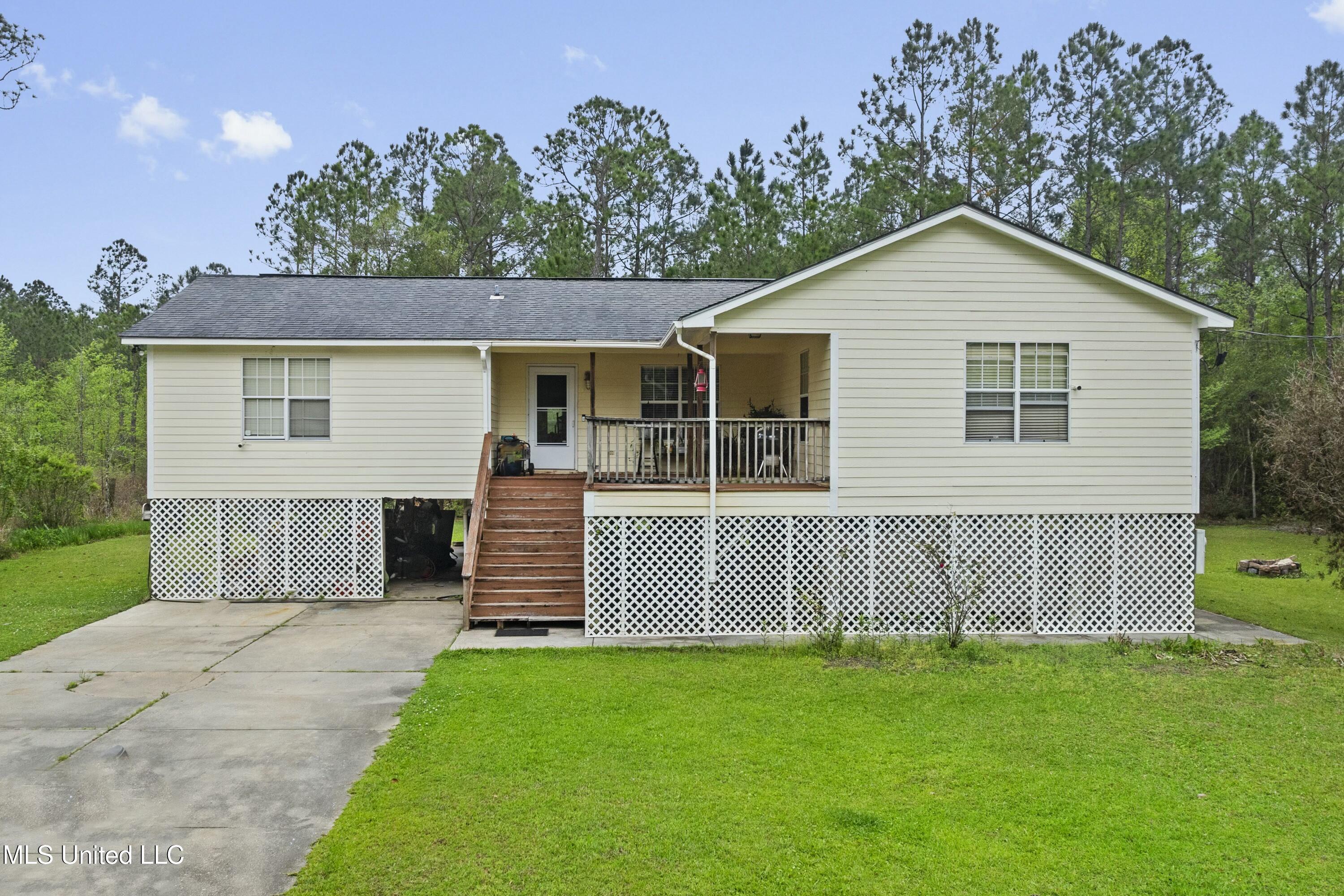 15075 Ponotoc Drive, Kiln, Mississippi image 1