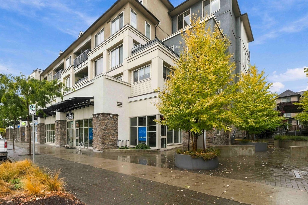 Photo of 20487 65 Avenue #A145, Langley, BC V2Y 3K5 (MLS # C8082479)
