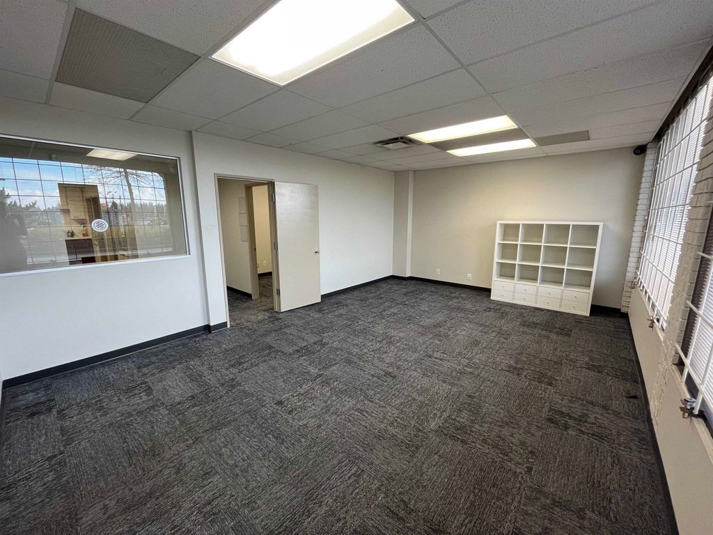Photo of 10706 King George Boulevard #102, Surrey, BC V3T 2X3 (MLS # C8076470)