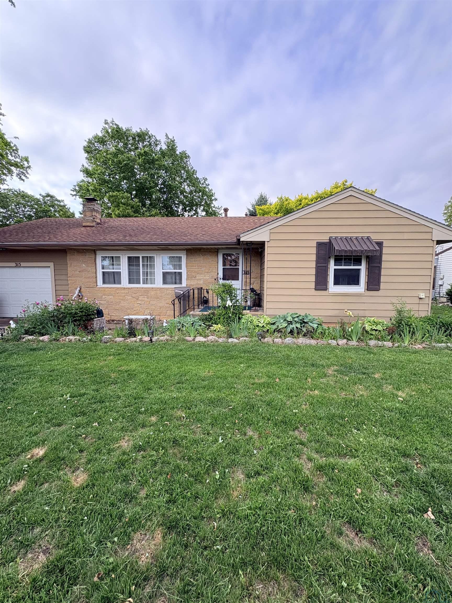 Photo 1 of 16 — 315 E 9TH ST, Storm Lake, IA 50588