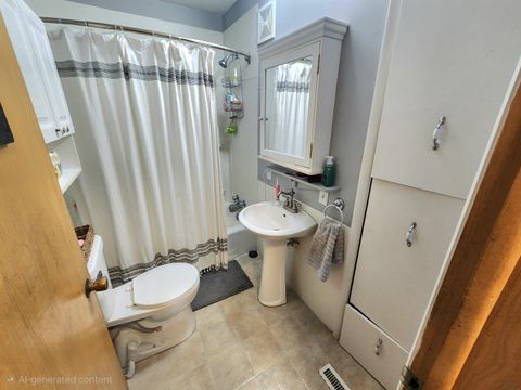 Tiny photo for 1013 Walnut St, Hull, IA 51239 (MLS # 832474)