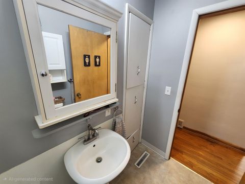 Tiny photo for 1013 Walnut St, Hull, IA 51239 (MLS # 832474)