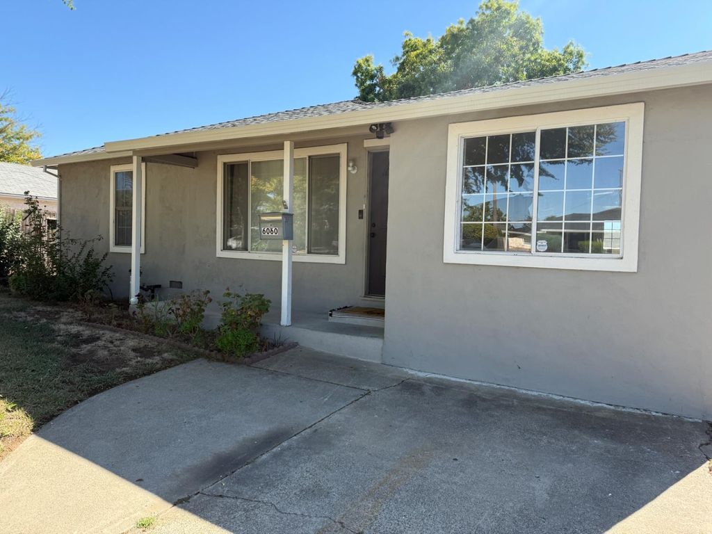 Photo of 6060 Mcmahon Drive, Sacramento, CA 95824 (MLS # 225129538)