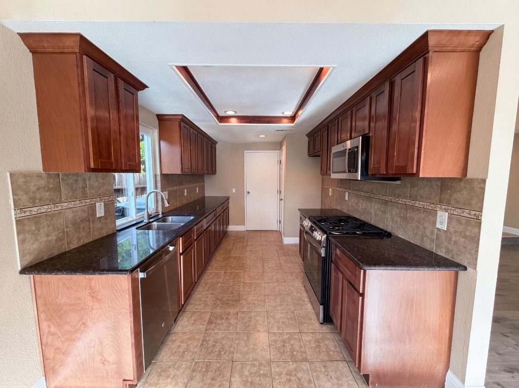 Photo of 8232 Moorhaven Way, Sacramento, CA 95828 (MLS # 226046898)