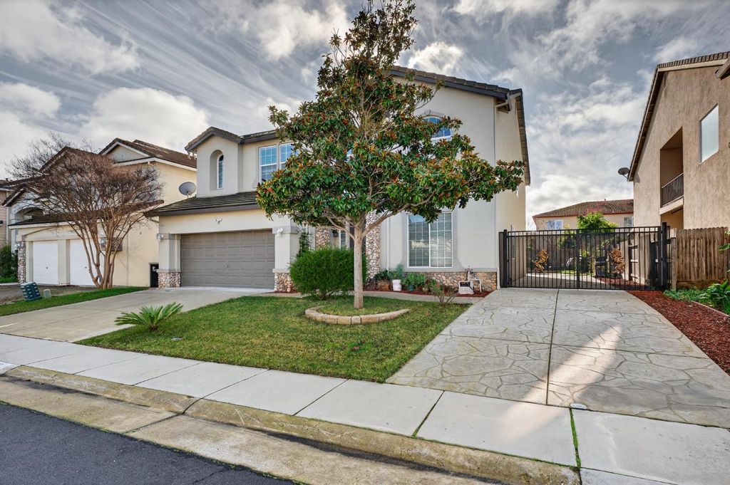 Photo of 9479 Winding River Way, Elk Grove, CA 95624 (MLS # 226004430)