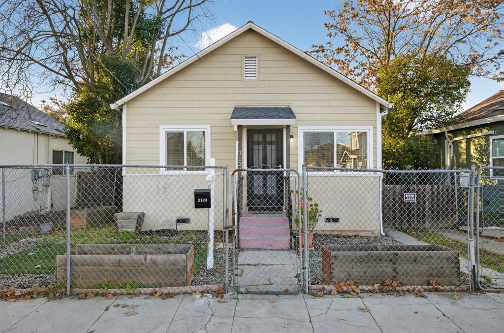 Photo of 3124 San Jose Way, Sacramento, CA 95817 (MLS # 226004120)