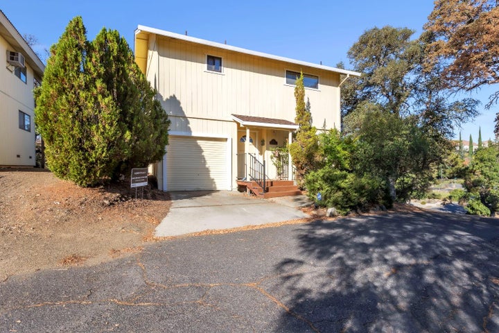 view of front of property with an attached garage and driveway