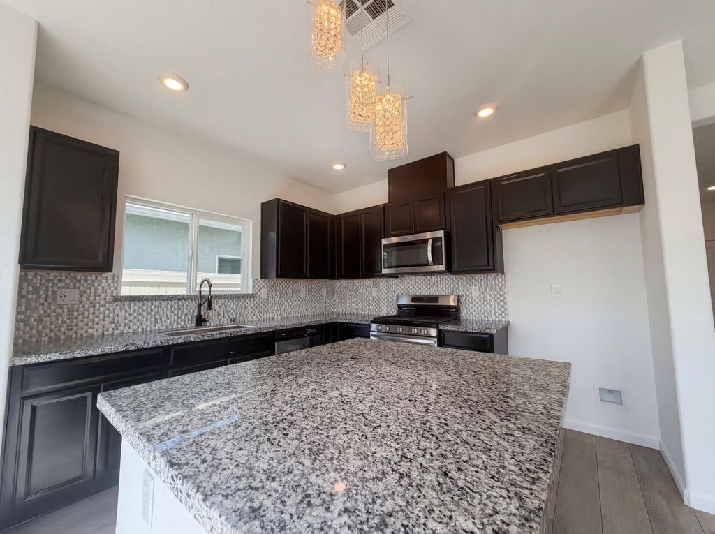 Photo of 1176 Willow Hill Avenue, Sacramento, CA 95834 (MLS # 226033781)